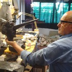 The Sculptor Silvano Porcinai is working on the wax